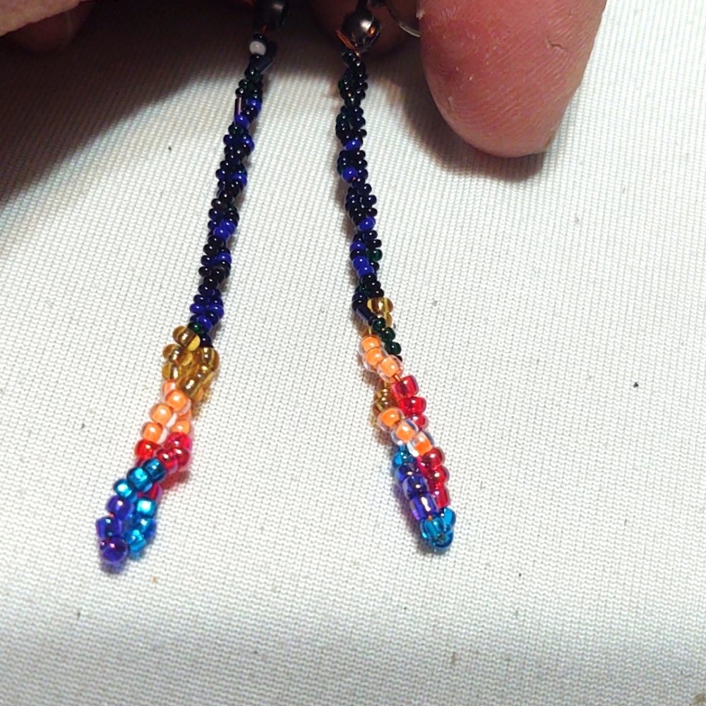 Simple and pretty handmade beaded spiral earrings.